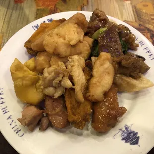 a plate of chinese food on a table
