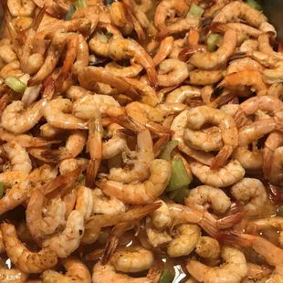 a pan of cooked shrimp and vegetables