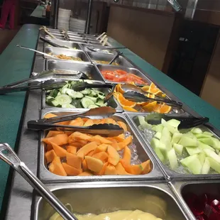 a variety of salads and condiments