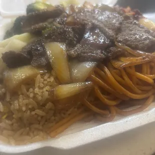Steak bourbon chicken veggies noodles and rice