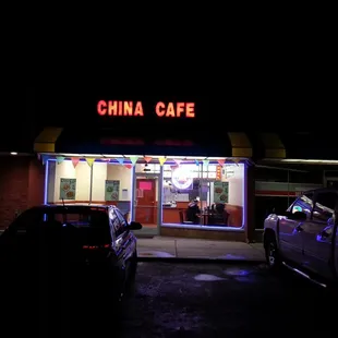 cars parked in front of the restaurant