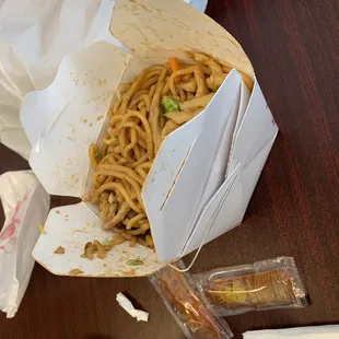 a plate of noodles and a cup of coffee