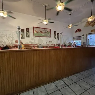 a view of the counter and dining area