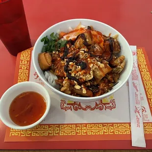 a bowl of food and a drink