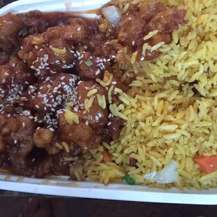 chicken and rice in a styrofoam container