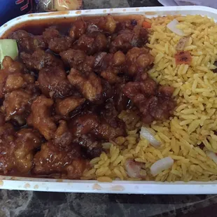 a meal of rice, meat and vegetables