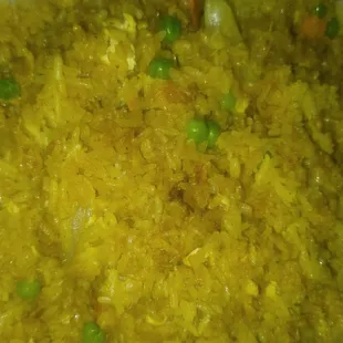 a bowl of rice and peas