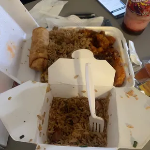 Combination fried rice, pork egg rolls and general tso chicken.