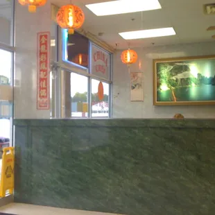 the entrance to a chinese restaurant