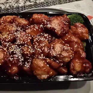 Sesame chicken, huge portions,  tasty, $12.95 is a steal!