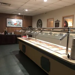 a buffet area with a variety of food items