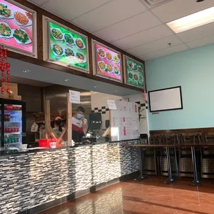 a view of a restaurant counter