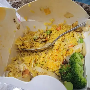 a bowl of rice and broccoli