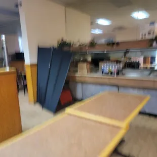 a blurry photo of a restaurant counter