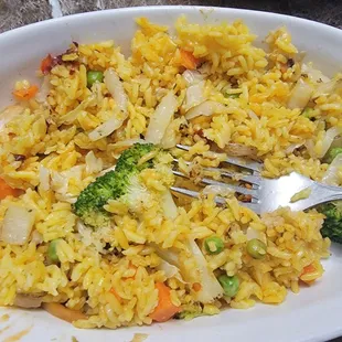 a plate of rice and vegetables
