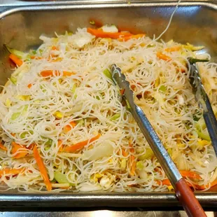 Singapore Noodles.  Very Mild.  *Pro Tip:  I Usually Add Some Sauce To Perk This Up.