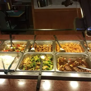 a buffet with a variety of food items