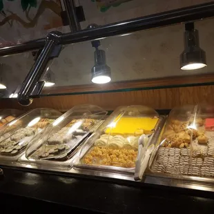 a buffet with a variety of food items