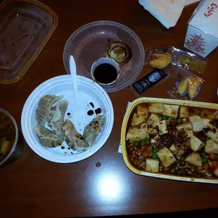 Mapo tofu,  steamed dumplings and hot and sour soup