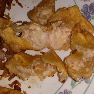 CRAP RANGOON FROM China City, Thomasville,NC Trust me, this is just how they were delivered to my home, Wet, Empty and uncooked!