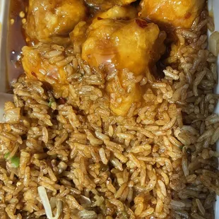 Orange  chicken  lunch special with side of Basic Fried Rice, spring roll and drink!