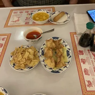 Egg drop soup, spring roll, and crab Rangoon