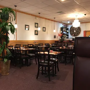 a restaurant with tables and chairs