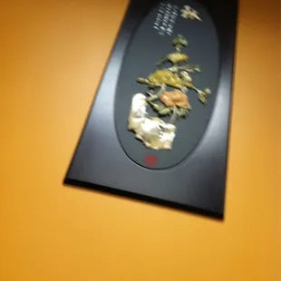 a picture of a dragon on a wall