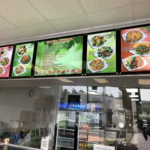 menus on the wall of a restaurant