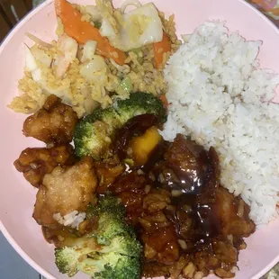 This is my plate I made once I got home. It's Orange Chicken w/White Rice &amp; Shrimp Fried Rice. It was soo GOOD!