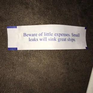 a piece of paper that says beware of little expenses small leaks will sink great ships
