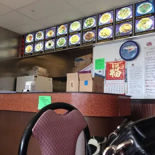 a restaurant counter and menus