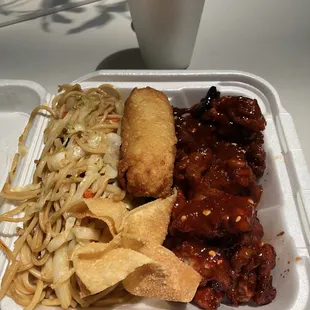 Orange chicken with chili sauce added, along with Lomein noodles, Crab Rangoon and egg roll.