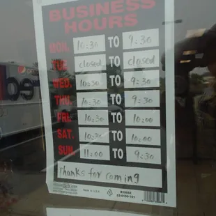 Hours of operation, front entry door.