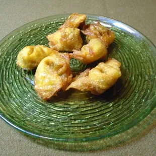 Fried wontons - overcooked, felt like chewing on plastic, bland, weird yellow color.