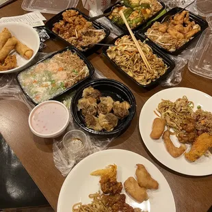 a table full of chinese food