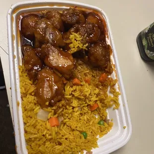 chicken and rice in a styrofoam container