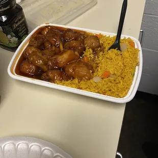 a plate of rice and a plate of meat
