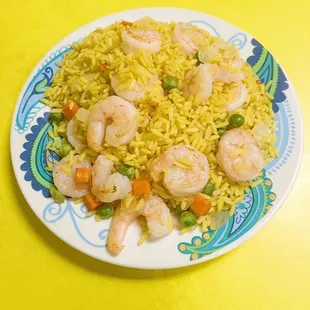 a plate of shrimp and rice