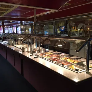 a buffet with a variety of food items