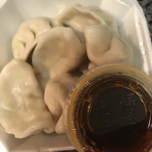 dumplings in a styrofoam container