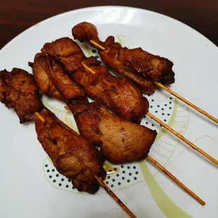 chicken skewers on a plate