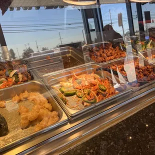 a variety of food items in a display case