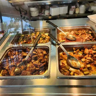 a variety of food items in a buffet