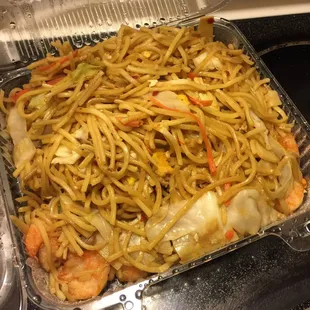 Spicy shrimp chow mein.. I bought my own chili peppers for them to cook into this dish