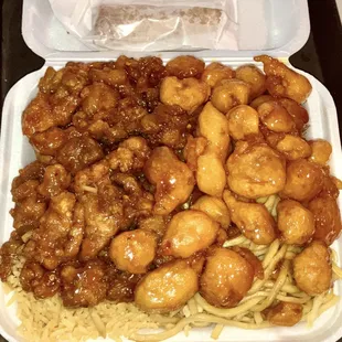 Orange and honey chicken with fried rice/ lo mein. Includes egg roll