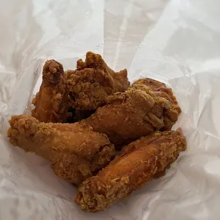 a pile of fried chicken wings