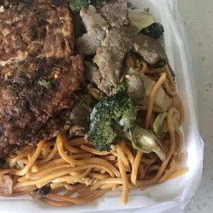 a meal in a styrofoam container