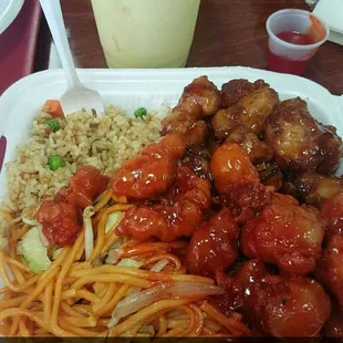 Mango smoothie 3 item combo. .orange chicken,sweet and sour pork,chow mein and fried rice..3rd item was 2 veggie spring rolls