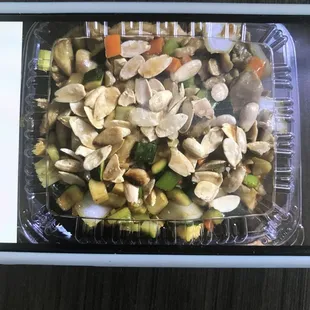 a tray of mushrooms and vegetables